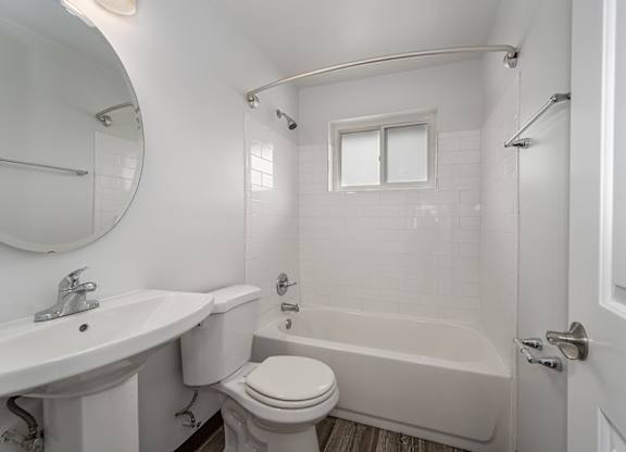 Fernview floor plan-renovated-new bathroom-tub,tile,sink, toilet