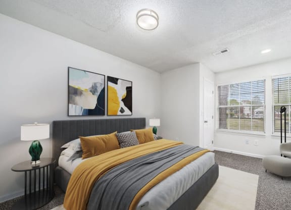 a bedroom with a bed and two windows at The Berryessa Apartments, Ohio, 98104