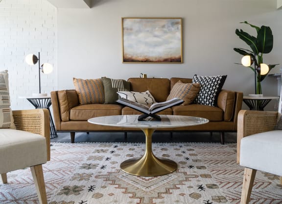 a living room with a couch and a coffee table at The Heights Apartments, Cincinnati, 45220