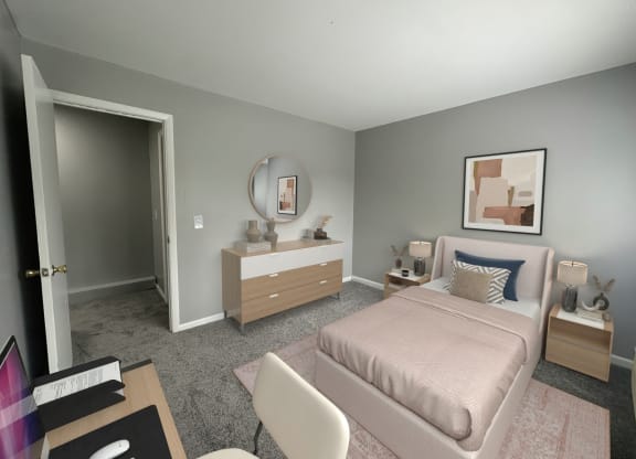 a bedroom with a bed and a dresser and a mirror