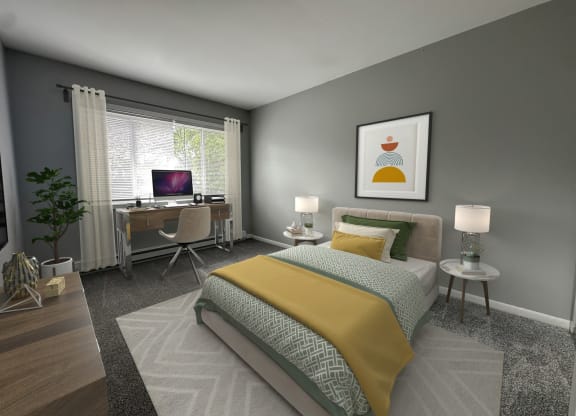 a bedroom with a bed and a desk with a computer