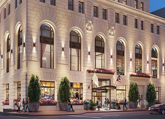 A large, elegant building with many windows and balconies is shown at Sky Central Apartments, Cincinnati, Ohio