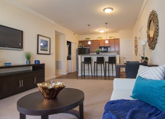 a living room with a couch and a table  at Grove City Summit, Grove City, OH, 43123