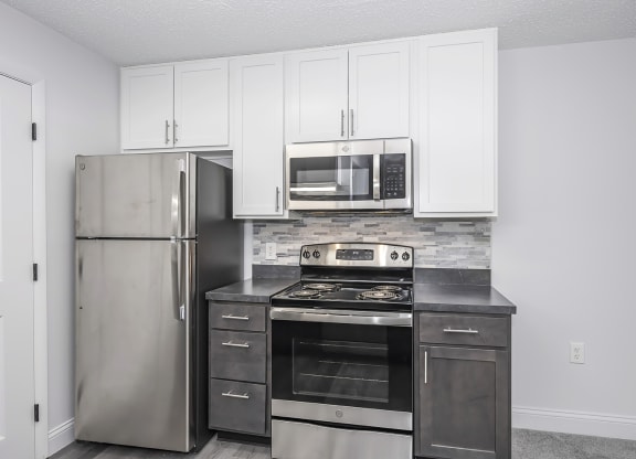 Electric Range In Kitchen at Honey Creek, Greenwood, Indiana