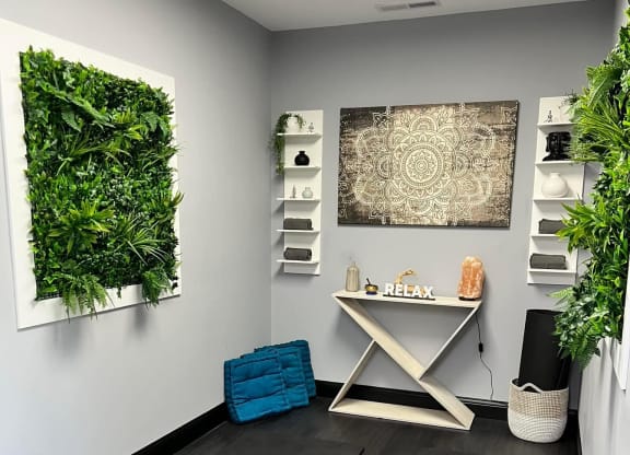 a room with a desk and plants on the wall at Ivy Hills Living Spaces, Ohio