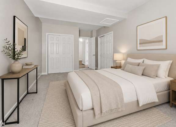 A bedroom with a large bed and a mirror on the wall.