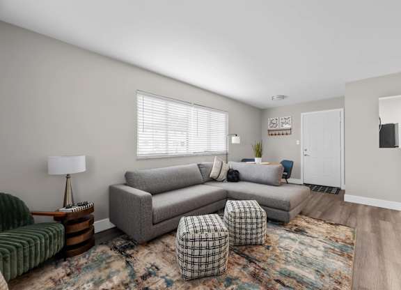 Living room with a rug at The Rand Apartments, Ohio