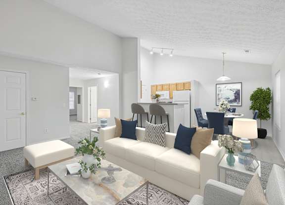 A living room with a white couch, a coffee table, and a rug.