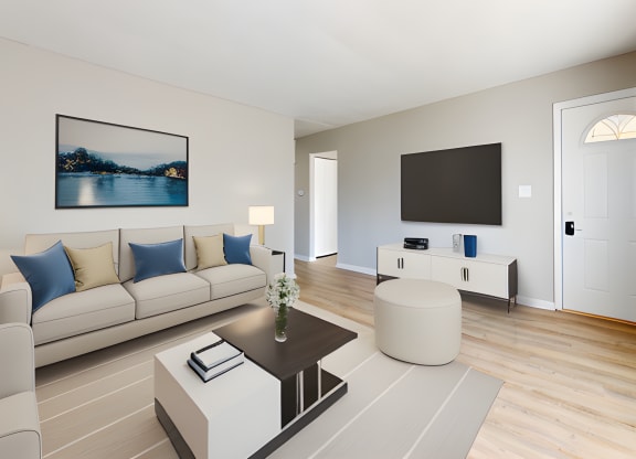 a living room with a couch and a coffee table at Stonebrook of Franklin, Franklin, 46131