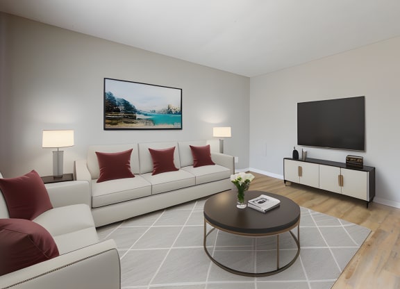 a living room with couches and a coffee table at Stonebrook of Franklin, Franklin, IN, 46131