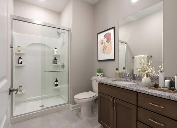 a bathroom with a shower and a toilet and a sink at Adelphi Quarter, Columbus, OH, 43203