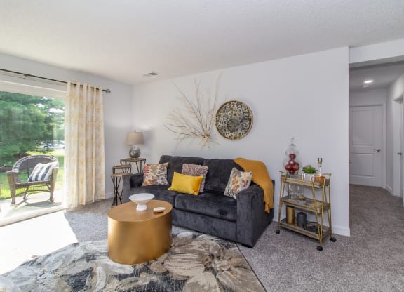 Living Room With Balcony at Timber Glen Apartments, Batavia, OH, 45103