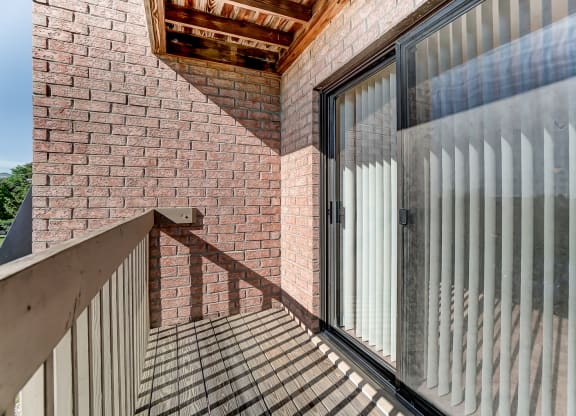 Balcony with Stunning Wooded Views at Mallard Landing Apartments , Marion, OH, 43302