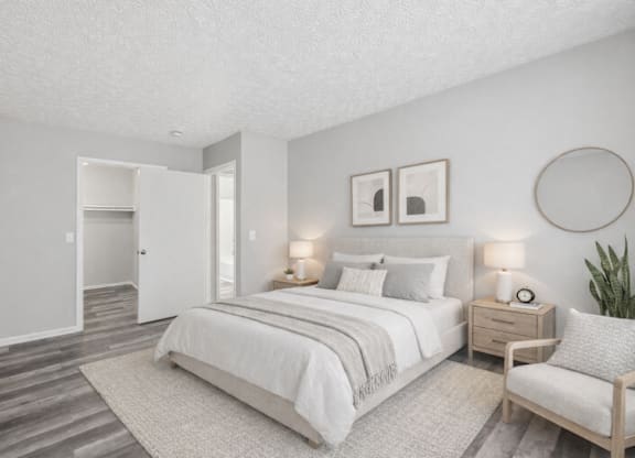 bedroom with chair, and a plant at Timbercreek Apts, Columbus Ohio