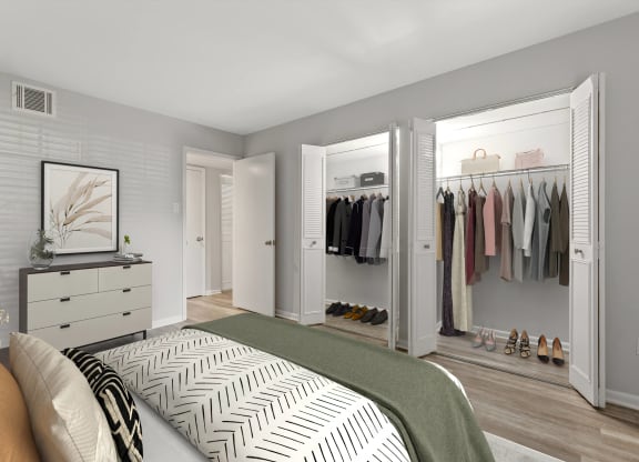Bedroom with a closet and a bed at Merrick Place, 40502