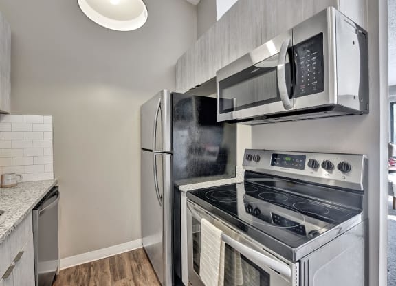 Kitchen gallery with appliances at The Reserve at Grand Valley, Milford, OH