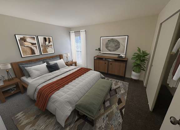 A bedroom with a bed, nightstand, and a plant.