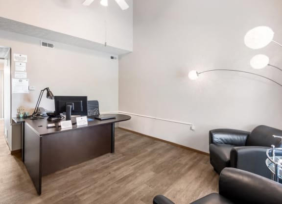 a living room with a desk and a couch at Parkside at Maple Canyon Apartments, Columbus, OH 43229