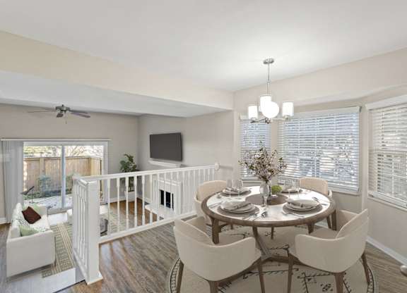 an open living room and dining room with a table and chairs at Merrick Place, Kentucky, 40502