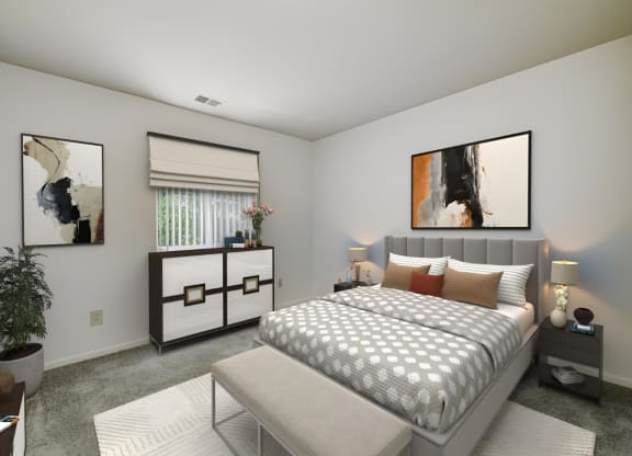 a bedroom with a bed and a table and a window at Quail Run Apartments, Columbus, IN, 47201