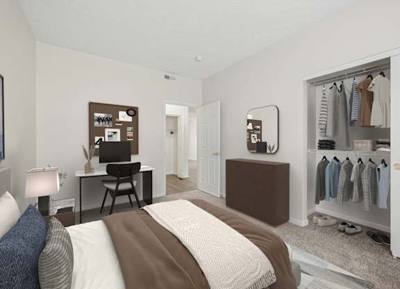 A bedroom with a bed, a desk, a chair, a wardrobe, and a mirror.