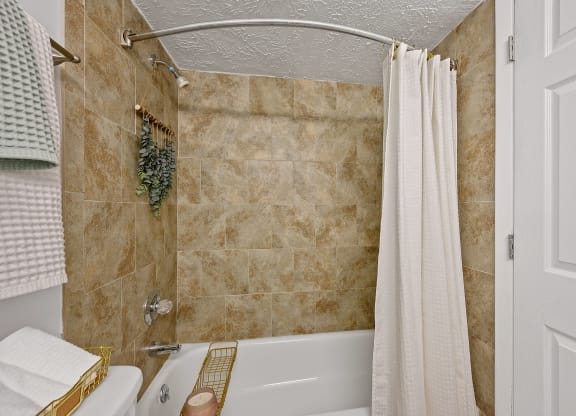 Bathroom with a shower and a tub and a shower curtain at Wrights Point,  41011