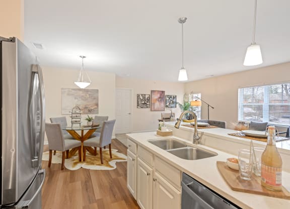 a kitchen and dining area at Roebling Row, Covington, KY, 41011-1720
