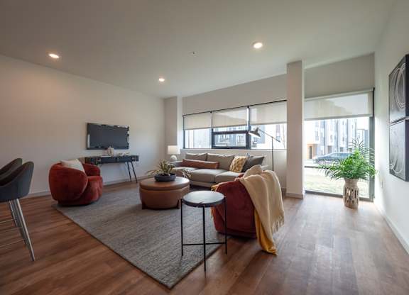 Modern Living Room at The Row on Merchant Apartments, Springdale