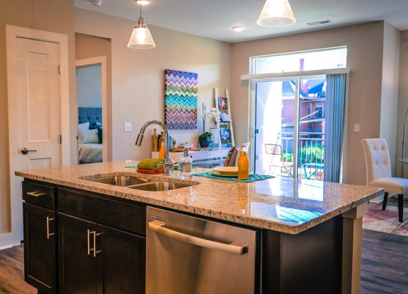 a kitchen with a sink and a dishwasher at DeSales Flats Apartments*, Cincinnati, Ohio