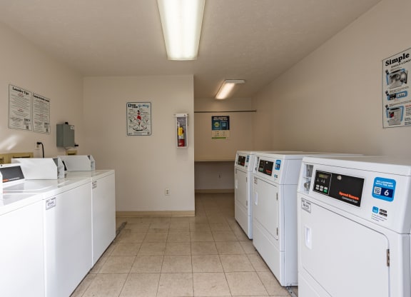 the laundry room is equipped with washes and dryers for your use  wh