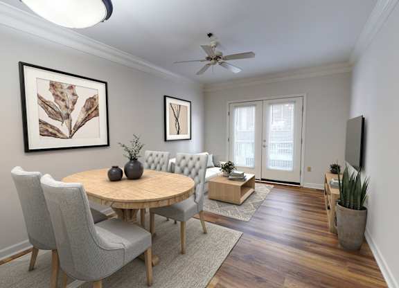 a dining room with a table and chairs