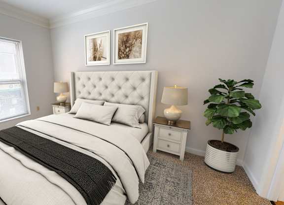 a bedroom with a bed and two windows