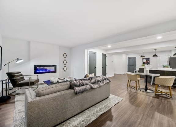 a living room and dining area in a 555 waverly unit