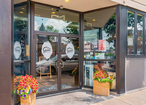 The storefront has a glass door at The Ridge Apartments, Cincinnati, OH