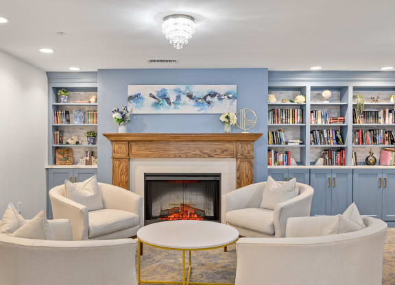 Living room with a fireplace and couches at The Valley, Ohio, 45242
