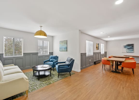 Living room with couches chairs and a table with a ping pong table in the at The Valley, Cincinnati, 45242