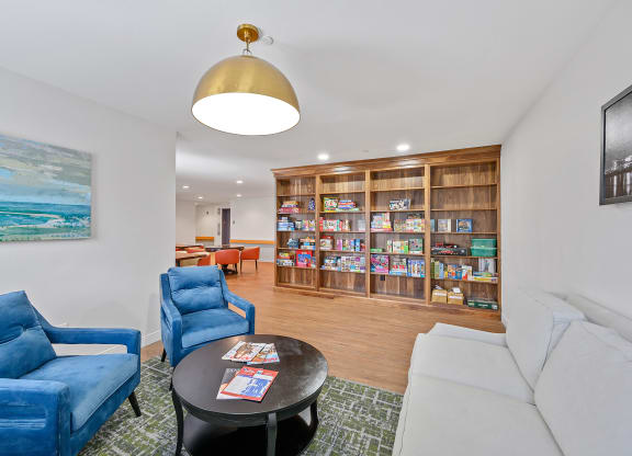 Living room filled with furniture and a large book shelf  at The Valley, Cincinnati, Ohio