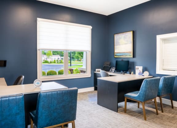 Office with blue chairs and a desk and a window at Waterstone Landing, Ohio