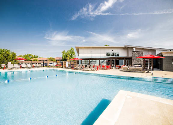 a large swimming pool with a building in the background at 7 Pointe Apartments, Indianapolis, IN, 46205