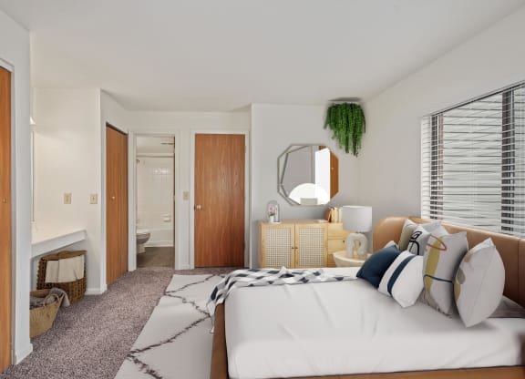 a bedroom with a large bed in a room at The Woodridge Collection, Fairfield, 45014