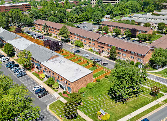 an aerial view of a large building in the middle of a street at Gainsborough Court Apartments, Fairfax, 22030
