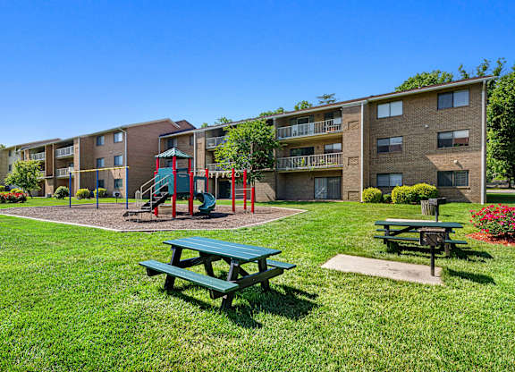 our apartments have a playground and picnic tables at Gainsborough Court Apartments, Fairfax, VA
