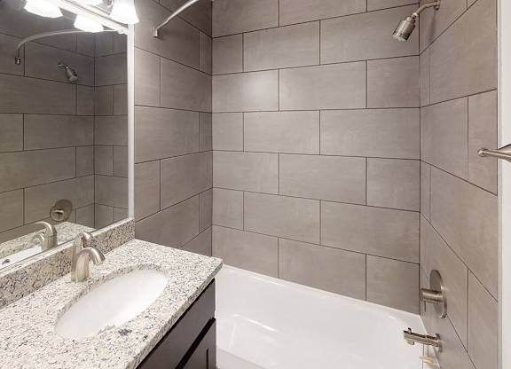 Modern interior view of bathroom in apartment unit at Woodlee Terrace Apartments, Woodbridge, VA, 22192