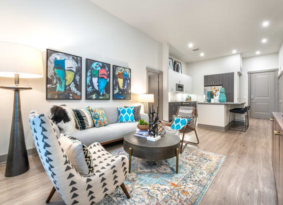 Live In Luxury and Enjoy a Spacious Living Room at The Bridge at McKinney, McKinney, Texas, 75069