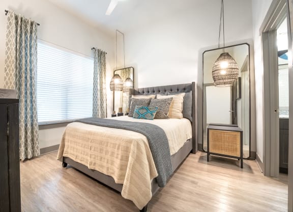 A Spacious Bedroom with Large Windows at The Bridge at McKinney, McKinney, Texas, 75069