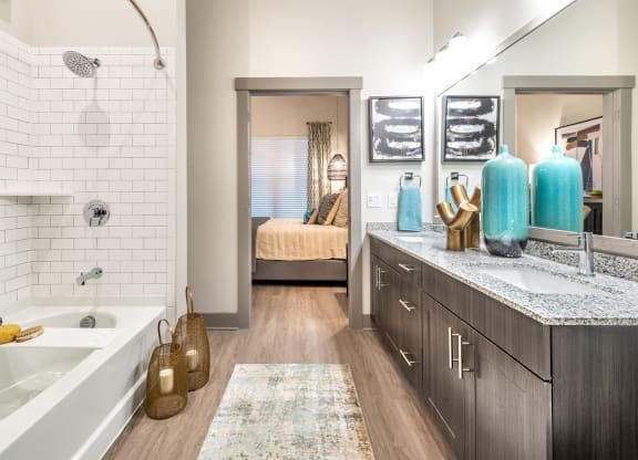 Spacious Bathroom with Oversized Soaking Tub and Designer Style Backsplash at The Bridge at McKinney, McKinney, Texas, 75069
