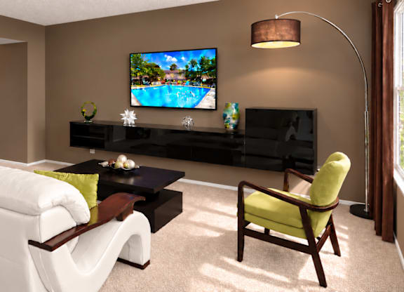 A living room with a white sofa, a green chair, and a television displaying a poolside scene.