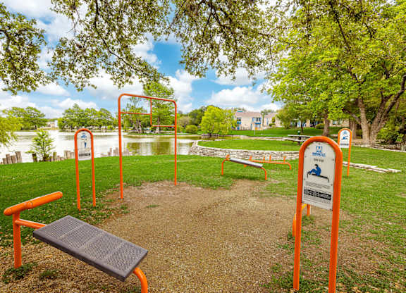 A park with a sign that says "M" on it.