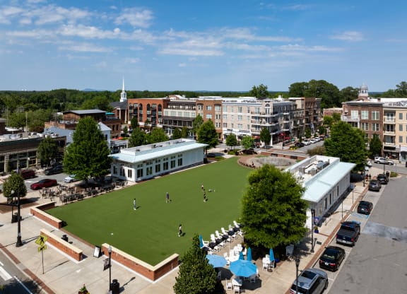 an aerial view of a park and buildings in a city