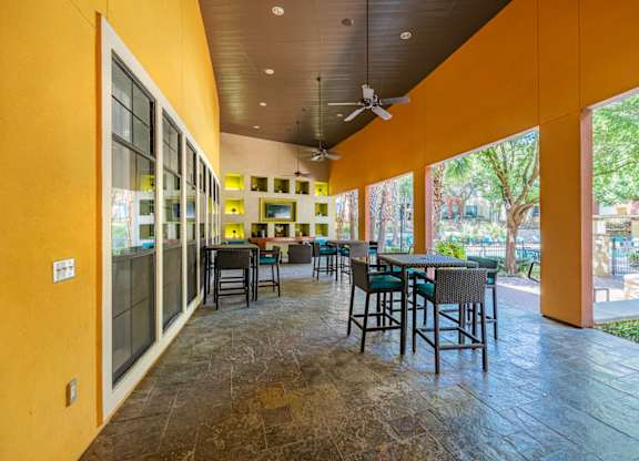 A patio with a table and chairs is shown.